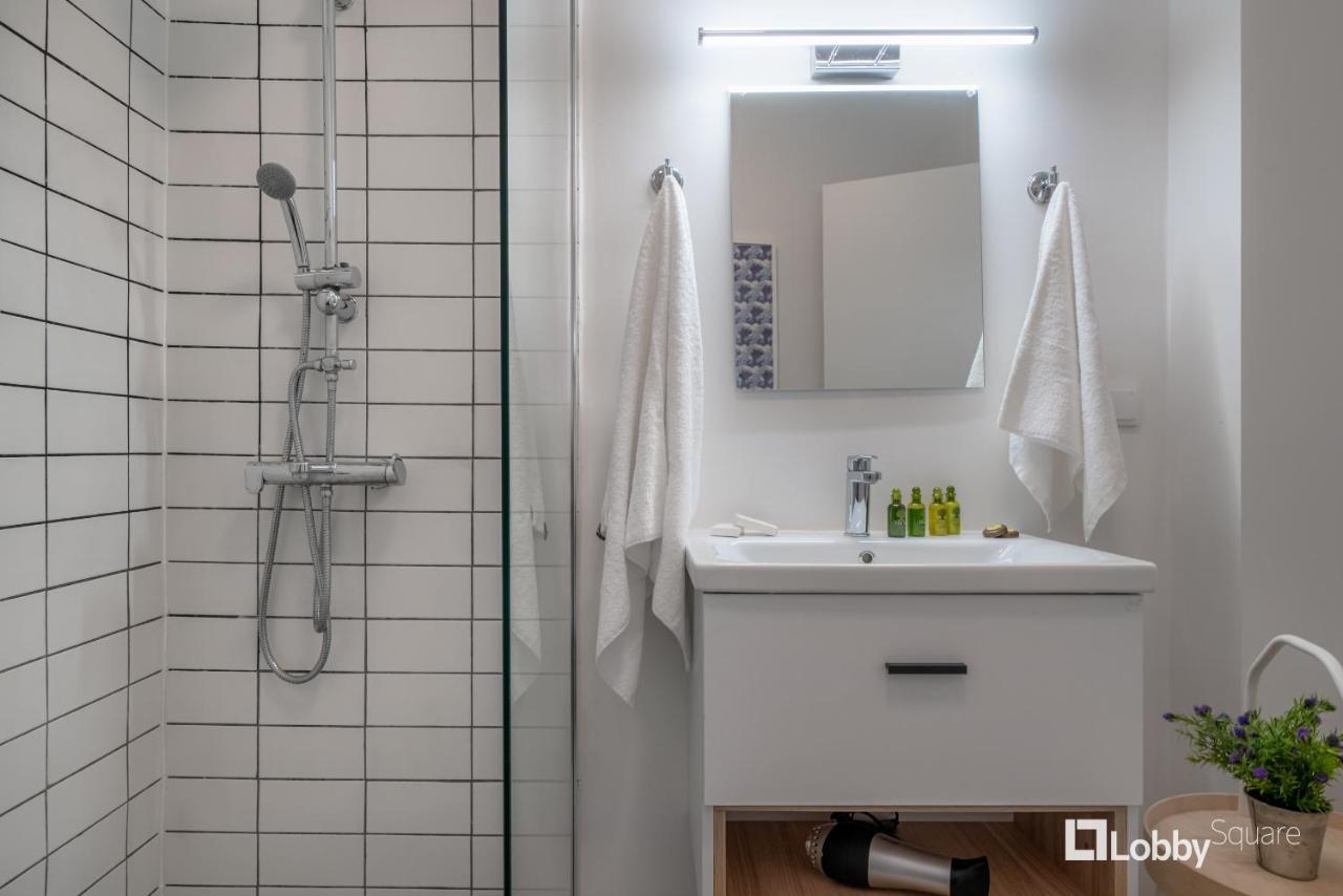 Aether Apartment By Lobbysquare Athena Bagian luar foto