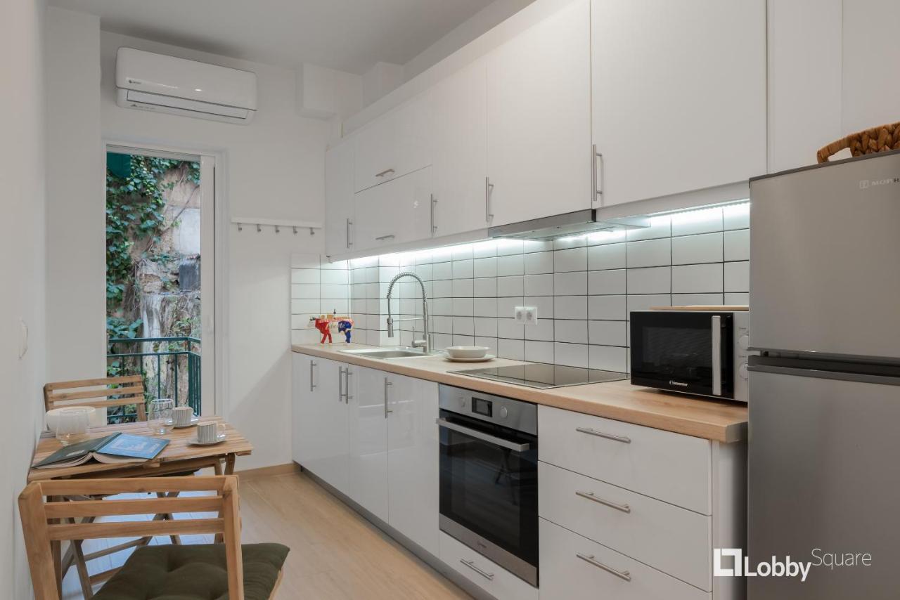 Aether Apartment By Lobbysquare Athena Bagian luar foto