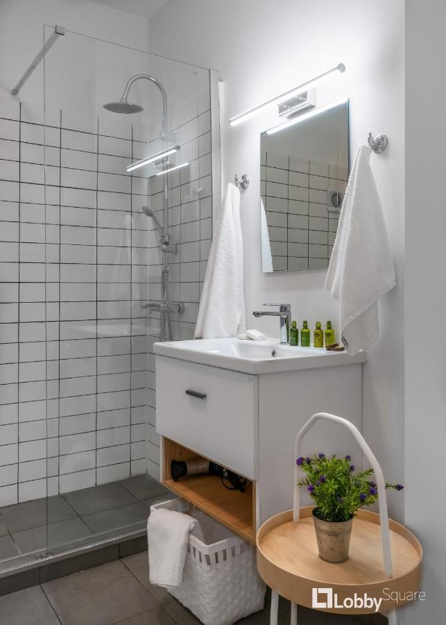 Aether Apartment By Lobbysquare Athena Bagian luar foto